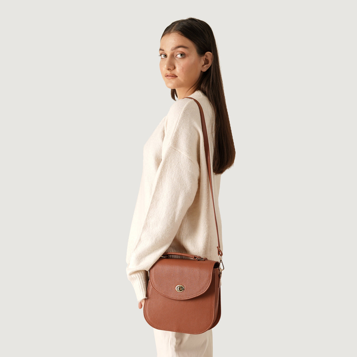 The Sandra Brown Cowhide Leather Saddle Bag