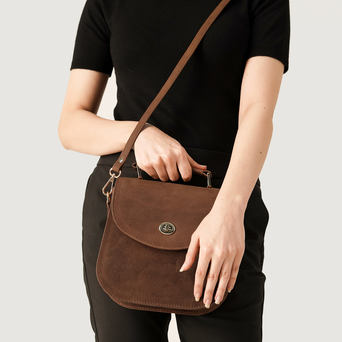 The Sandra Vintage Tan Milled Leather Saddle Bag