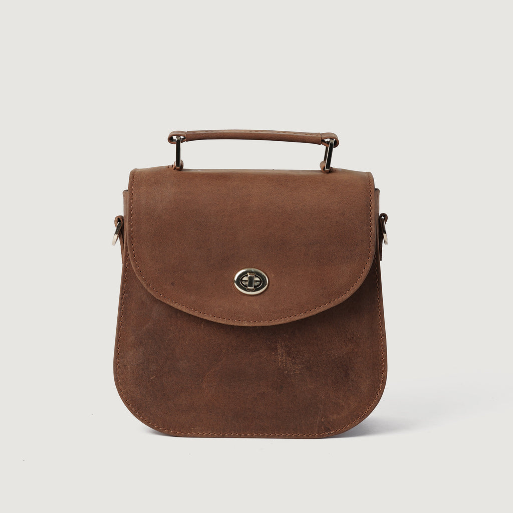 The Sandra Vintage Tan Milled Leather Saddle Bag
