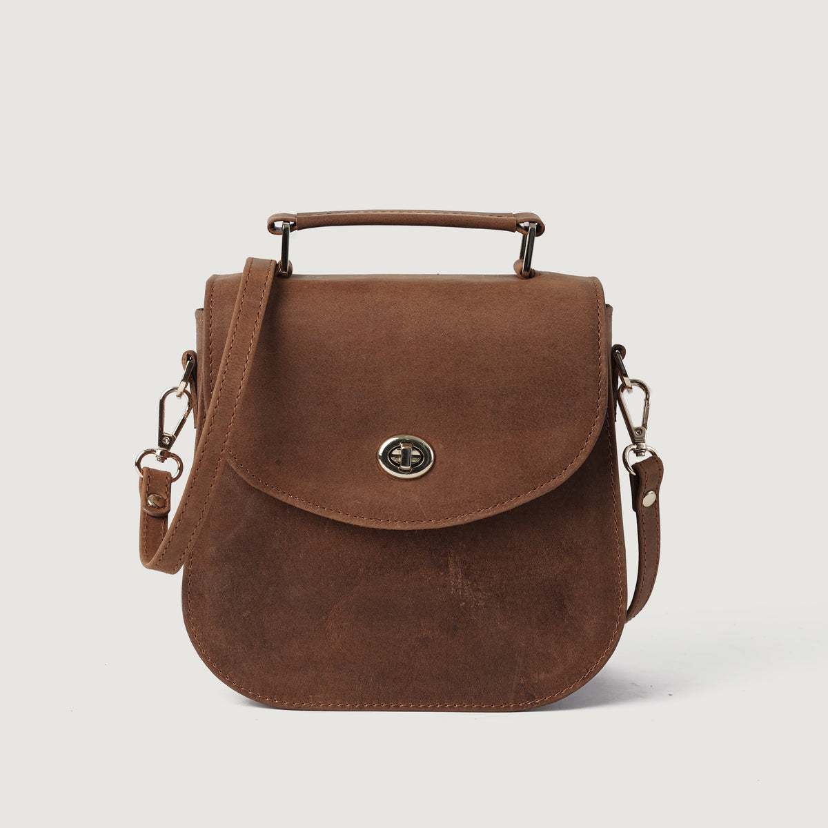 The Sandra Vintage Tan Milled Leather Saddle Bag
