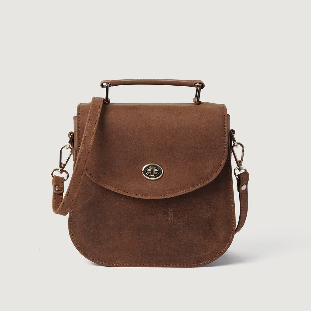 The Sandra Vintage Tan Milled Leather Saddle Bag